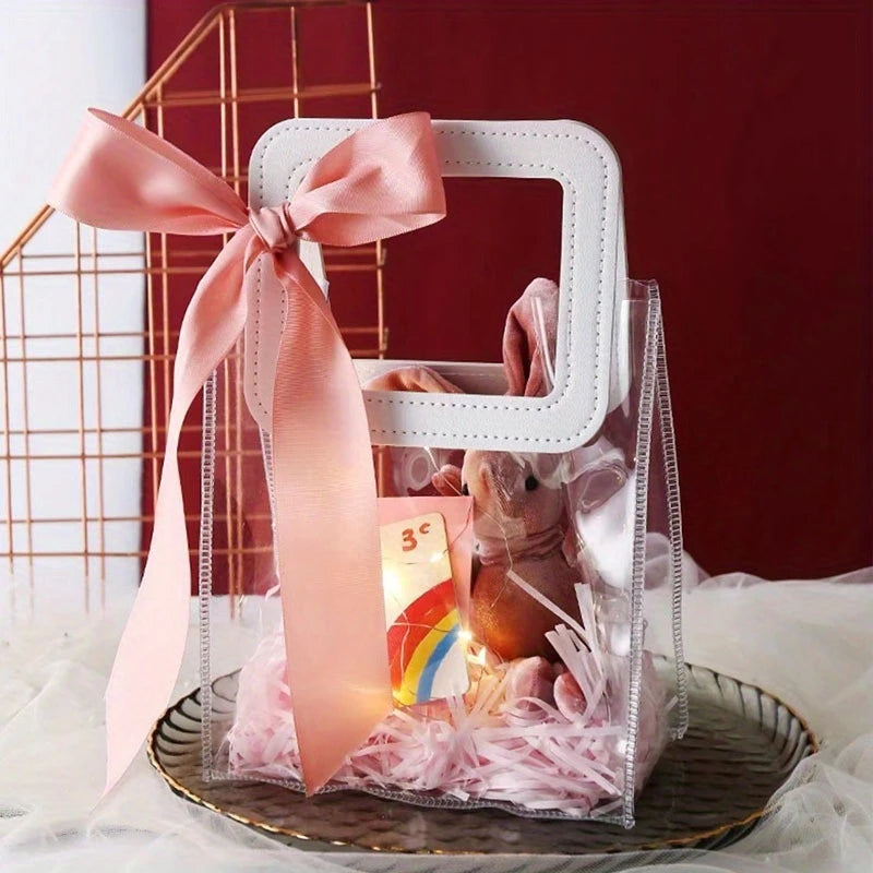 شنته بلاستيكيه شفافه بيد جلديه انيقه