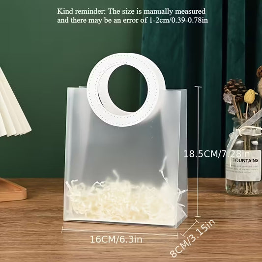 كيس هدايا بلاستيكي شفاف بمسكه جلد