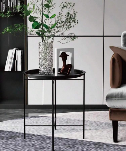 طاولة جانبية معدنية دائرية – تصميم مودرن باللون الأسود