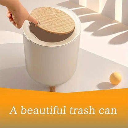 سلة نفايات عصرية بغطاء يعمل بالضغط وأرجل خشبية