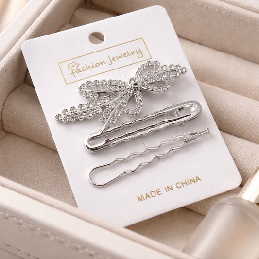 طقم كلبسات شعر (3 قطع) مرصعة بالكريستال.